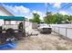Backyard and parking area featuring a trailer and a white pickup truck at 1054 13Th S Ave, St Petersburg, FL 33705