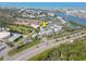 Aerial view of a residential complex near a waterway, showcasing its location and surroundings at 14800 Walsingham Rd # 301, Largo, FL 33774