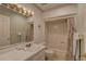 Clean bathroom with a single sink vanity and shower-tub combination at 14800 Walsingham Rd # 301, Largo, FL 33774