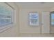 This empty bedroom has tile floors and plenty of natural light at 1601 24Th S St, St Petersburg, FL 33712