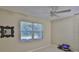 Bedroom with view from the window and a ceiling fan at 1601 24Th S St, St Petersburg, FL 33712