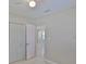 This bedroom features tile flooring, a ceiling fan, and double closet at 1601 24Th S St, St Petersburg, FL 33712