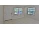 Well lit Living room, with a door and tile floor at 1601 24Th S St, St Petersburg, FL 33712