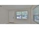 Well lit Living room, with a window, door and tile floor at 1601 24Th S St, St Petersburg, FL 33712