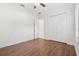 Light-filled bedroom with hardwood floors and a spacious closet provides a comfortable and organized retreat at 1819 Bella Casa Ct, Tampa, FL 33618