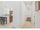 Hallway with a view of kitchen and bedroom at 1819 Bella Casa Ct, Tampa, FL 33618
