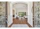 Spacious foyer entrance leading to a well lit living room with an open concept design at 1819 Bella Casa Ct, Tampa, FL 33618