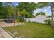 Backyard featuring a patio area with gazebo and grill, perfect for outdoor entertaining and relaxation at 23211 Lucerne Pl, Land O Lakes, FL 34639