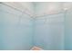 Walk-in closet with white wire shelving and blue wall paint at 23211 Lucerne Pl, Land O Lakes, FL 34639