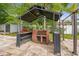 Outdoor gazebo with grill, perfect for backyard barbecues and outdoor entertaining with friends and Gathering at 23211 Lucerne Pl, Land O Lakes, FL 34639