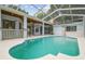 A refreshing swimming pool inside a screened enclosure offers an excellent backyard experience at 23211 Lucerne Pl, Land O Lakes, FL 34639