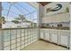 Poolside wet bar featuring glass block accents and ample counter space for serving drinks at 23211 Lucerne Pl, Land O Lakes, FL 34639