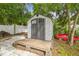 Shed with double doors is perfect for storing tools, equipment, and outdoor gear in an organized way at 23211 Lucerne Pl, Land O Lakes, FL 34639