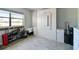 Bedroom featuring a large window, and built in bed at 2400 Winding Creek Blvd # 2-201, Clearwater, FL 33761