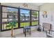 Relaxing lanai showcasing an inviting outdoor space and lots of natural lighting at 2400 Winding Creek Blvd # 2-201, Clearwater, FL 33761