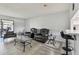 Bright and airy living area with comfortable seating, a modern coffee table, and an open layout at 2400 Winding Creek Blvd # 2-201, Clearwater, FL 33761