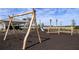 Community playground with swings and slide; a great place for families to enjoy outdoor recreation at 29477 Velletri Ln, Wesley Chapel, FL 33543