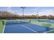 Well-maintained community tennis and pickleball courts with professional surfacing and lighting at 29477 Velletri Ln, Wesley Chapel, FL 33543