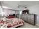 Bedroom featuring neutral walls, a ceiling fan, and plenty of storage at 2955 Briar Cliff Dr, Palm Harbor, FL 34684