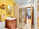Bathroom showcasing stylish walk-in shower, vanity with sink, decorative tiling and ample natural light at 326 16Th Ne Ave, St Petersburg, FL 33704