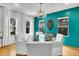 Dining room featuring modern light fixture, large windows, and stylish decor at 326 16Th Ne Ave, St Petersburg, FL 33704