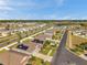 Neighborhood street view with homes featuring solar panels on the roofs at 4201 Globe Thistle Dr, Tampa, FL 33619