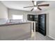 Bedroom featuring a bunk bed, ceiling fan, shelves, and carpeted floor at 4201 Globe Thistle Dr, Tampa, FL 33619