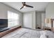 Bedroom with carpeted floor and ceiling fan at 4201 Globe Thistle Dr, Tampa, FL 33619