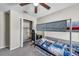 Bedroom with a bunk bed, closet, ceiling fan, and carpeted floor at 4201 Globe Thistle Dr, Tampa, FL 33619