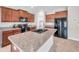 Modern kitchen with granite countertops, stainless steel appliances, and ample cabinet space at 4201 Globe Thistle Dr, Tampa, FL 33619