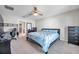 Bedroom featuring carpet flooring, a ceiling fan, and space for a desk at 4201 Globe Thistle Dr, Tampa, FL 33619