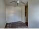 Small bedroom with ceiling fan and built-in shelving at 440 S Bayshore Dr, Madeira Beach, FL 33708