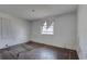 Empty bedroom with visible floor, window, and curtain at 440 S Bayshore Dr, Madeira Beach, FL 33708