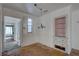 Dining room with hardwood floors, built in shelves, and chandelier at 440 S Bayshore Dr, Madeira Beach, FL 33708