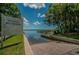 Lanbrook private boat ramp with 'No Trespassing' sign, ideal for residents to access the water at 4693 Aylesford Dr, Palm Harbor, FL 34685
