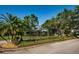 Elegant Aylesford community sign surrounded by lush landscaping, enhancing the neighborhood's appeal at 4693 Aylesford Dr, Palm Harbor, FL 34685