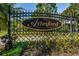 Aylesford community entrance sign surrounded by well-maintained greenery, symbolizing an upscale neighborhood at 4693 Aylesford Dr, Palm Harbor, FL 34685