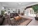 Expansive living area connecting the kitchen and breakfast nook, perfect for entertaining at 4693 Aylesford Dr, Palm Harbor, FL 34685