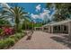 Community pavilion with seating and lush landscaping, perfect for gatherings and relaxing in a scenic environment at 4693 Aylesford Dr, Palm Harbor, FL 34685