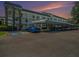 Beautiful multi-story condo complex featuring convenient covered parking and well-maintained grounds at 4801 Airport Rd # 118, Zephyrhills, FL 33542