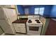 Functional kitchen with essential appliances offering convenient meal preparation and storage at 4801 Airport Rd # 118, Zephyrhills, FL 33542