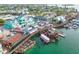 A lively waterfront district with colorful buildings, docks filled with boats, and scenic waterside dining at 500 45Th S St, St Petersburg, FL 33711