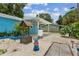 Backyard area with a well, white gravel, and covered carport at 500 45Th S St, St Petersburg, FL 33711