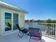 Balcony with seating overlooking the water at 5623 Jobeth Dr, New Port Richey, FL 34652