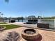 Private boat dock with water access and a fire pit, ideal for relaxing and enjoying waterfront living at 5623 Jobeth Dr, New Port Richey, FL 34652