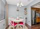 Bright dining area featuring stylish furniture and ample natural light for delightful meal experiences at 5850 21St N St # 12, St Petersburg, FL 33714