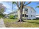 Multi-unit condo building with well-kept landscaping and inviting walkways at 5850 21St N St # 12, St Petersburg, FL 33714
