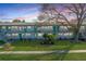 Charming condo building with well-maintained lawns, mature trees and walkways at 5850 21St N St # 12, St Petersburg, FL 33714