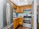 Efficient kitchen featuring stainless steel appliances and ample cabinet space for a modern cooking experience at 5850 21St N St # 12, St Petersburg, FL 33714