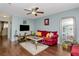Cozy living room with plush seating and modern amenities at 5850 21St N St # 12, St Petersburg, FL 33714
